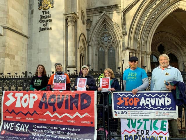 Portsmouth residents and members of the community campaign group Let's Stop Aquind, outside the Royal Courts of Justice in London during the judicial review in November Picture: Tom Pilgrim/PA Wire