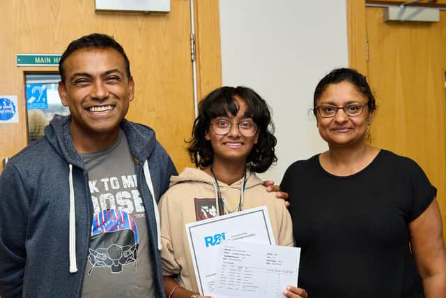 Pictured is Karishma Mistry (age 16) with dad Kamlesh and mum Beejal.
Picture: Vernon Nash