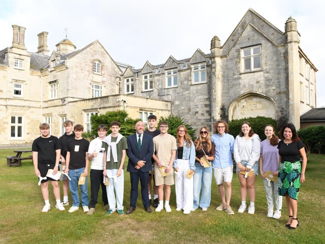 A-Level results day at King's Academy Bay House in Gosport, Hampshire.Students with Christopher Willis headteacher and Stacey Osborne, head of 6th form.Please credit: Paul Jacobs/pictureexclusive.com
