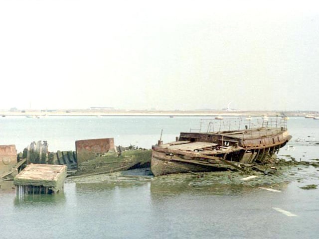 The wrecks in the harbour Portchester are evidently of Viva, a Gosport Ferry built in the 1890's.