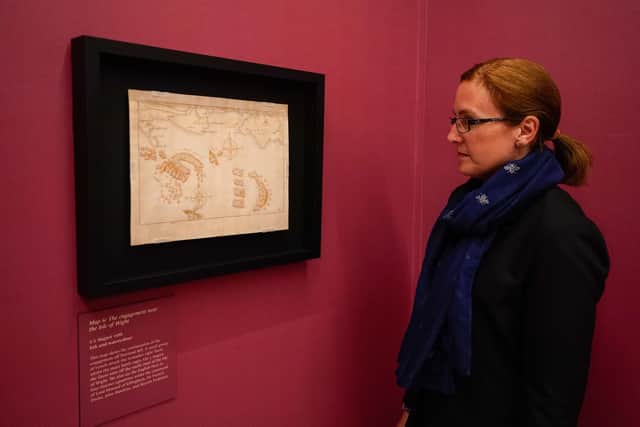 Louisa Blight, head of collections and research at the National Museum of the Royal Navy, looks at one of a rare collection of Spanish Armada Maps on display for the first time
Picture date: Tuesday June 20, 2023. PA Photo. See PA story HERITAGE Armada.