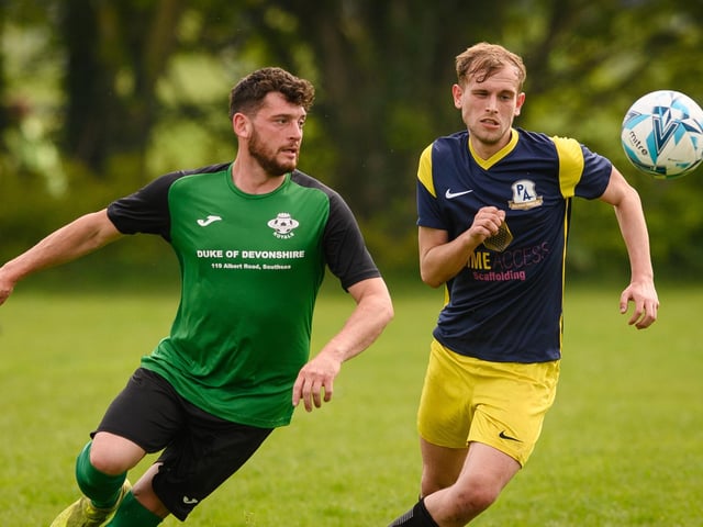 Action from Saturn Royale's 1-0 win over Pelham Arms (blue and yellow kit) in the second Adelaide Cup semi-final. Picture: Keith Woodland (300421-210)