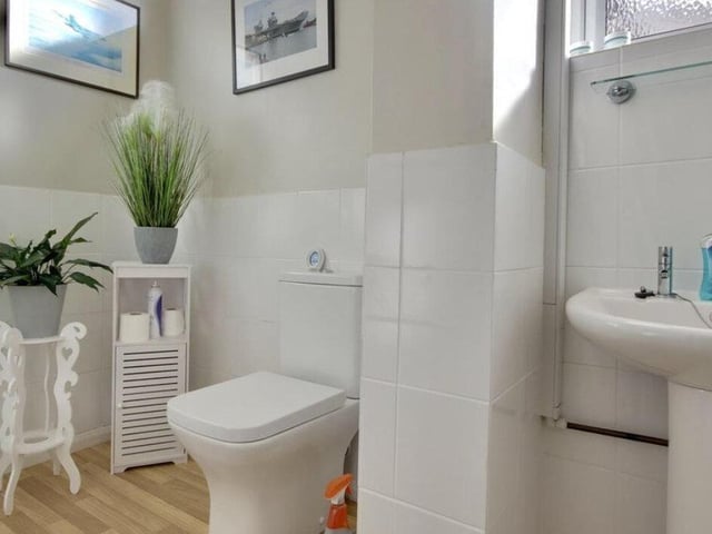 The listing says: "This property is modern, offers spacious rooms throughout and has beautiful original features making it the perfect family home. Downstairs you benefit from the dining room with bay, modern kitchen, shower room, lounge to the rear and the conservatory. Upstairs you have three good size double bedrooms, a study/cot room and the second shower room."