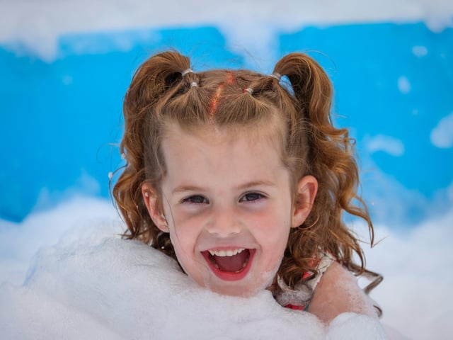 Pictured - Harlia Davison, 4, enjoying the foam pit. Photos by Alex Shute.