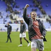 Terry Devlin salutes the Pompey fans following his recent match-winner at Reading
