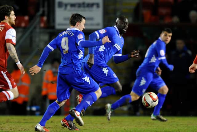 Former Pompey players David Connolly and Patrick Agyemang, seen here against Leyton Orient in March 2013, had a curious dressing room confrontation. Picture: Allan Hutchings