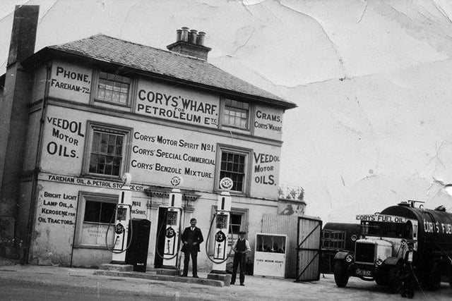 Corys Wharf, at the Quay, Fareham. My grandparents and family lived there. Thechap in the suit is Frank Smith's grandfather, Frederick Hubbard. This photo is circa 1931. Note the price of fuel at 1/3d per gallon says Frank Smith who posted this lovely image