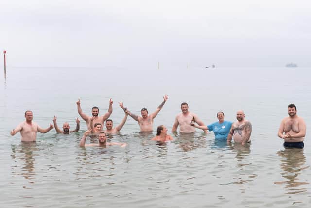 The walkers enjoy a cooling dip at the end of their walk.

Picture: Keith Woodland