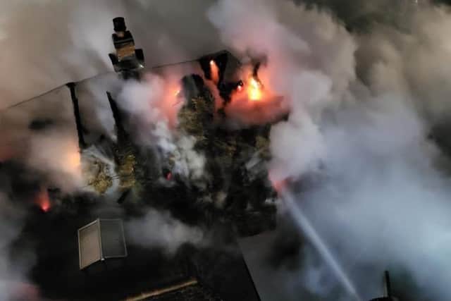 A fire has destroyed a large part of a thatched-roof property in Clanfield.