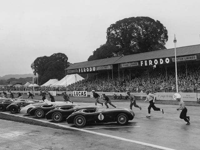 Drivers running to their cars at the start of the 9-hour International Sports Car Race at the Goodwood Circuit, West Sussex, 16th August 1952. The competitors include Stirling Moss (far right) and Tony Rolt (1918 - 2008, second from right). (Photo by Don Price/Fox Photos/Hulton Archive/Getty Images)
