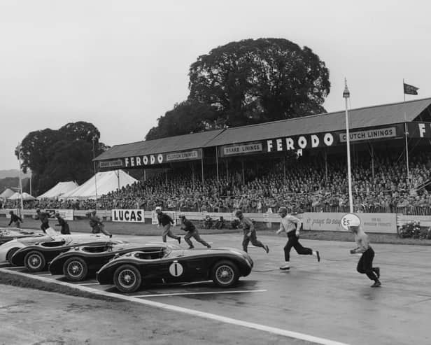 Drivers running to their cars at the start of the 9-hour International Sports Car Race at the Goodwood Circuit, West Sussex, 16th August 1952. The competitors include Stirling Moss (far right) and Tony Rolt (1918 - 2008, second from right). (Photo by Don Price/Fox Photos/Hulton Archive/Getty Images)