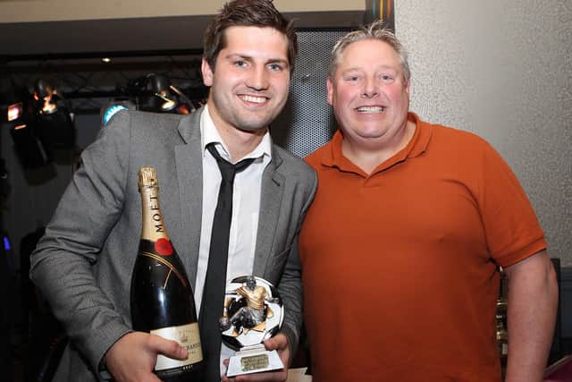 Steve Ramsey with Hawks vice chairman James Fallon after winning the 2011/12 players' player of the season award. Ramsey scored 14 goals that season, including four in a 6-3 Conference South win at Dorchester. Pic: Dave Haines.