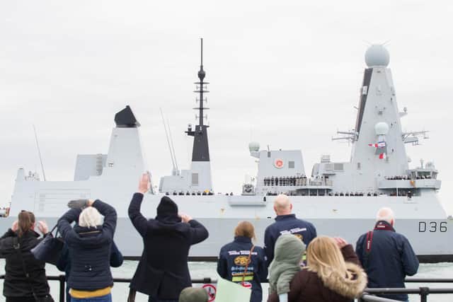 Hundreds of people crowded onto the Hot Walls to welcome HMS Defender home.

Picture: Habibur Rahman