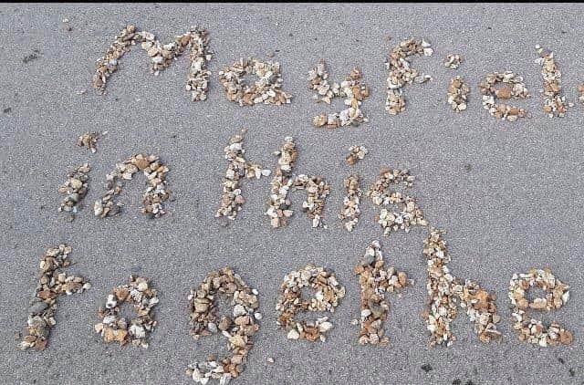 One teacher used pebbles to pass on their message of hope to students.