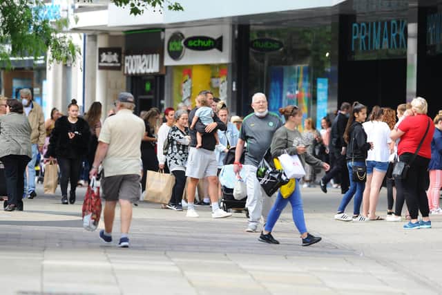 Queues in Commercial Road persisted through most of the morning. Picture: Sarah Standing (150620-4137)