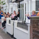 Residents outside their homes in Battenburg Avenue, Portsmouth, clapping for carers on April 14, 2020.
Picture: Habibur Rahman