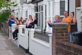 Residents outside their homes in Battenburg Avenue, Portsmouth, clapping for carers on April 14, 2020.
Picture: Habibur Rahman