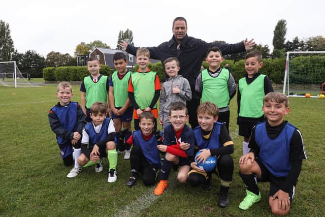 Fleur de Lys U8 Victory with their coach at the reopening of the Drayton Park pavilion. Picture: Chris Moorhouse