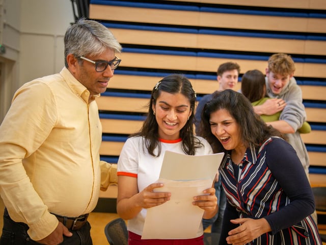 Ashlyn Khan opening her results.