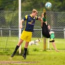 Action from Saturn Royale's 1-0 win over Pelham Arms (blue and yellow) in the Adelaide Cup semi-final. Picture: Keith Woodland