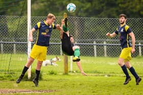 Action from Saturn Royale's 1-0 win over Pelham Arms (blue and yellow) in the Adelaide Cup semi-final. Picture: Keith Woodland