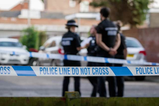 Police have launched an appeal to track down an attempted armed robber. Pictured is a library photo of police in Portsmouth. Photo: Habibur Rahman