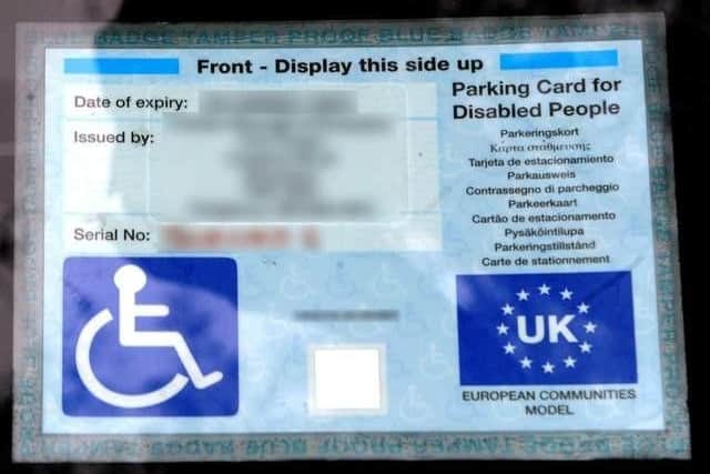 Stock picture of a Blue Badge permit.