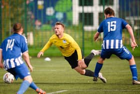 Burrfields win a penalty against Wickham. Picture: Keith Woodland