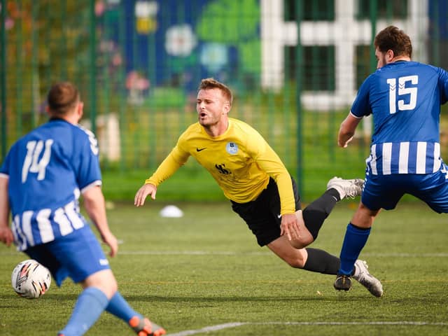 Burrfields win a penalty against Wickham. Picture: Keith Woodland