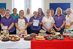 Mitie UPO Staff at HMS Sultan held a charity cake sale for Harbour Cancer Support. Picture: Royal Navy
