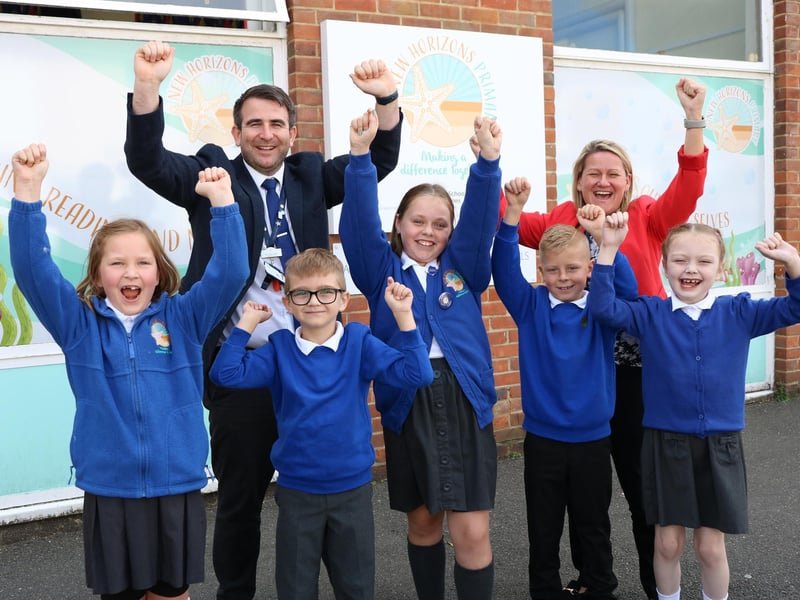 New Horizons Primary School has been rated good in recent Ofsted inspection. 
The report was published on September 28, 2023.
Pictured: Head of School, Mr Jones, and students.