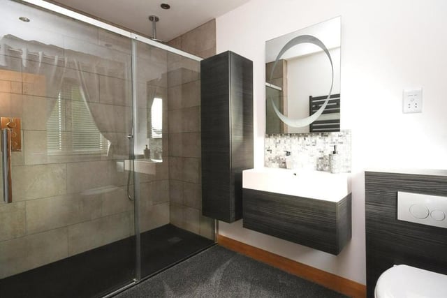The en suite facilities to the master bedroom offer the wow factor. A large, walk-in shower is the highlight.