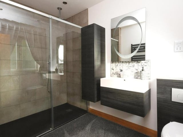 The en suite facilities to the master bedroom offer the wow factor. A large, walk-in shower is the highlight.