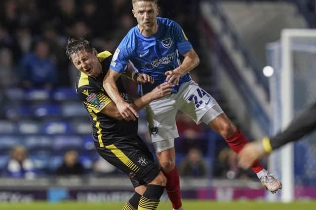 Michael Jacobs under pressure against Sutton