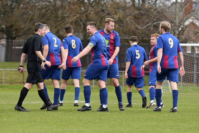 Cameron Quirke is all smiles after equalising for USP. Picture: Neil Marshall