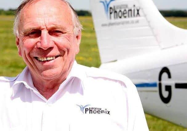 Director of Phoenix Aviation, Frank Thompson, is welcoming schoolgirl Lucy Jenkins for a week of work experience.