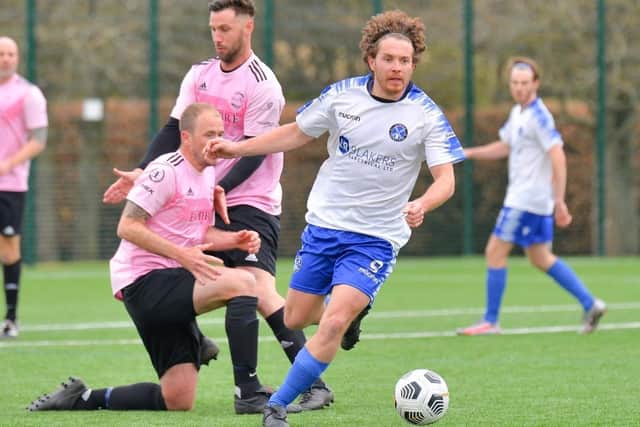 James Barker (white shirt) put Clanfield ahead in their 2-2 Hampshire Premier League draw with Sway at Westleigh Park.