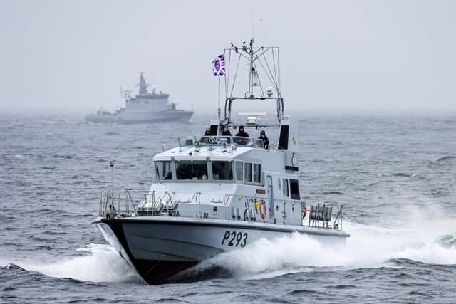 HMS Ranger flies a special Jubilee flag with Lithuanian patrol boat Dzūkas in the distance during a workout ahead of joining the Baltops 22 Nato drill