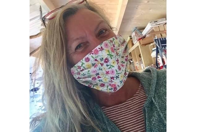 Jo Melton, from Stubbington, runs The Seaside Sew and has been creating face masks during lockdown to raise £500 for Mind mental health charity. Pictured: Jo in one of her handmade masks