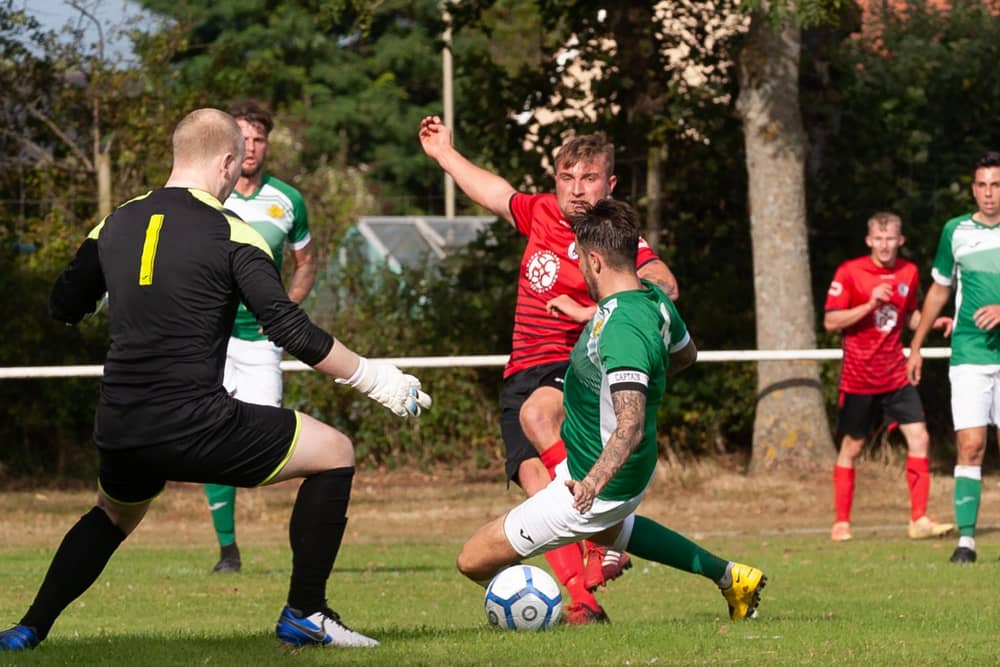Ryan Bath (red) has scored 23 league and cup goals in as many appearances for Locks Heath this season. Picture: Keith Woodland