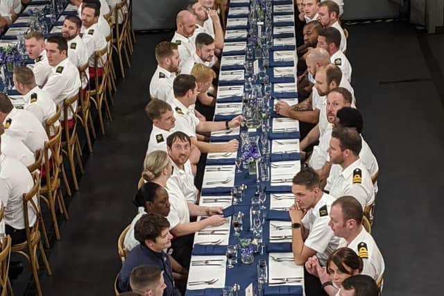Some of the ship's coming pictured before tucking into their three-course meal made by MasterChef semi-finalists. Photo: Royal Navy