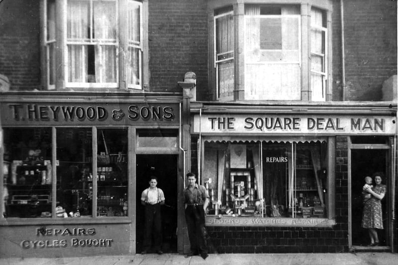 Heywood and Sons and The Square Deal shop.   Heywoods cycle shop at 270/272 Lake Road with the Square Deal shop was next door. Can anyone recognise the lady with baby in her arms in the doorway?
