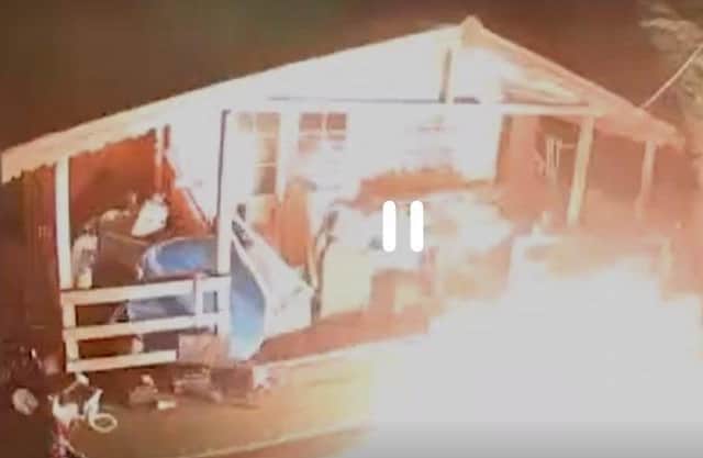 CCTV of a petrol bomb being thrown into a neighbour's garden in Leigh Park over a grudge. Pic Wessex CPS