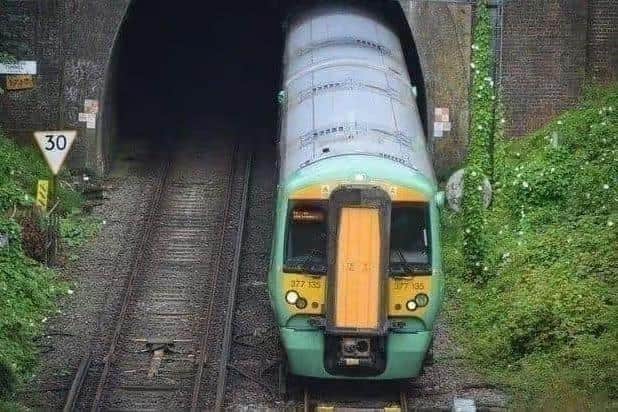 A tree blocking the line has caused delays 