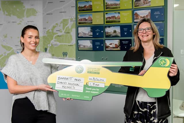 Barratt Homes presents a cheque to the Hampshire and Isle of Wight Air Ambulance