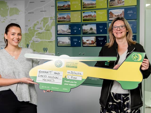 Barratt Homes presents a cheque to the Hampshire and Isle of Wight Air Ambulance