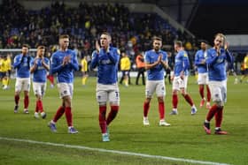 Pompey players applaud the travelling faithful following the heartbreaking 3-2 defeat at Oxford United. Picture: Jason Brown/ProSportsImages