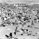 Standing room only, thousands of sun seekers packed Southsea's beaches at the weekend as the temperatures continued to hover in the eighties, July 10, 1983. The News PP4454