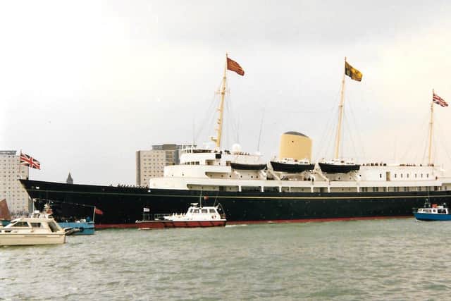The former Royal Yacht Britannia, with standards at her mastheads during a visit in Portsmouth. Photo: Jenny Vincent