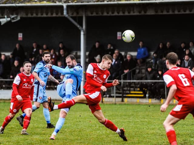 Brett Pitman scores one of his hat-trick goals at Bournemouth Poppies. Picture by Daniel Haswell